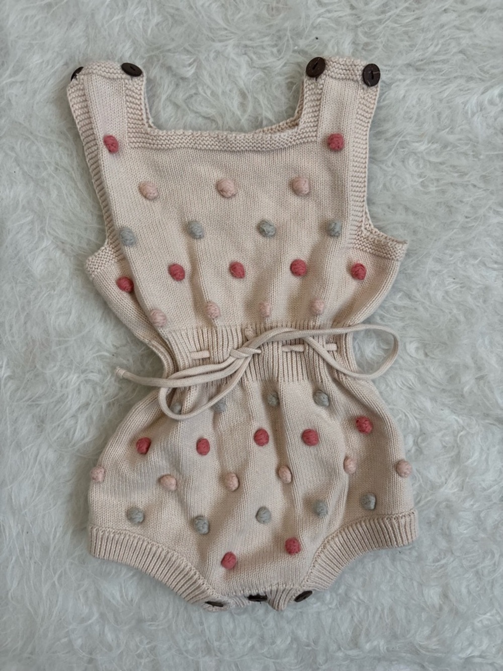Cottagecore Cream Knit Baby Romper with Pastel Pom Poms